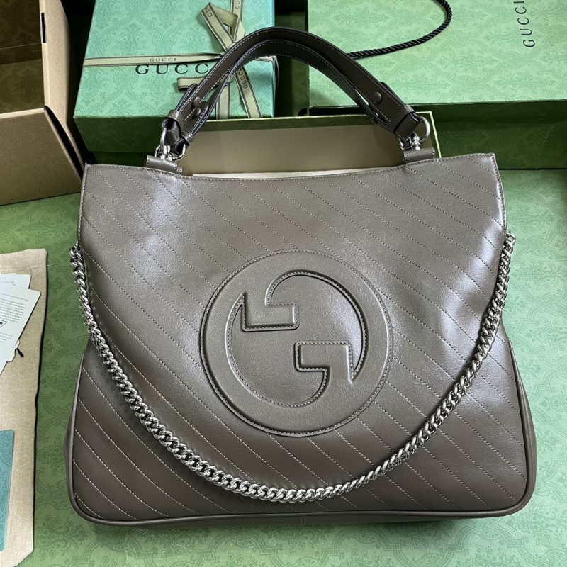 G*u*i top handle bags